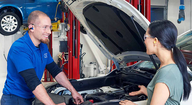 BCAA Auto Service Technician helping out a Member