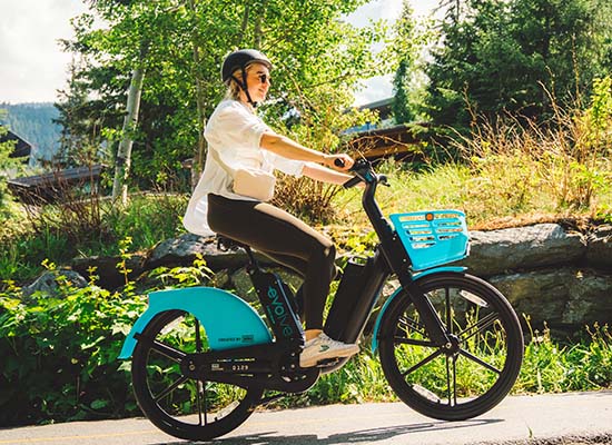 Woman riding Evolve e-bike