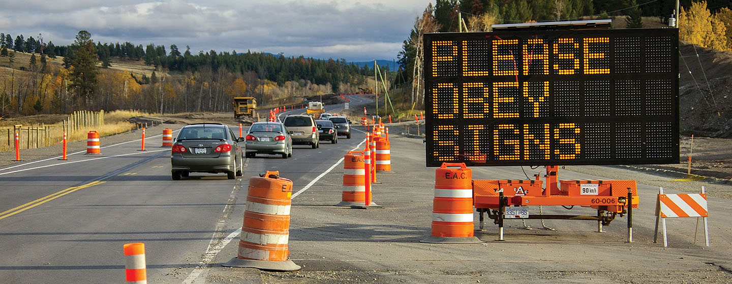 Please Obey Signs sign on BC road