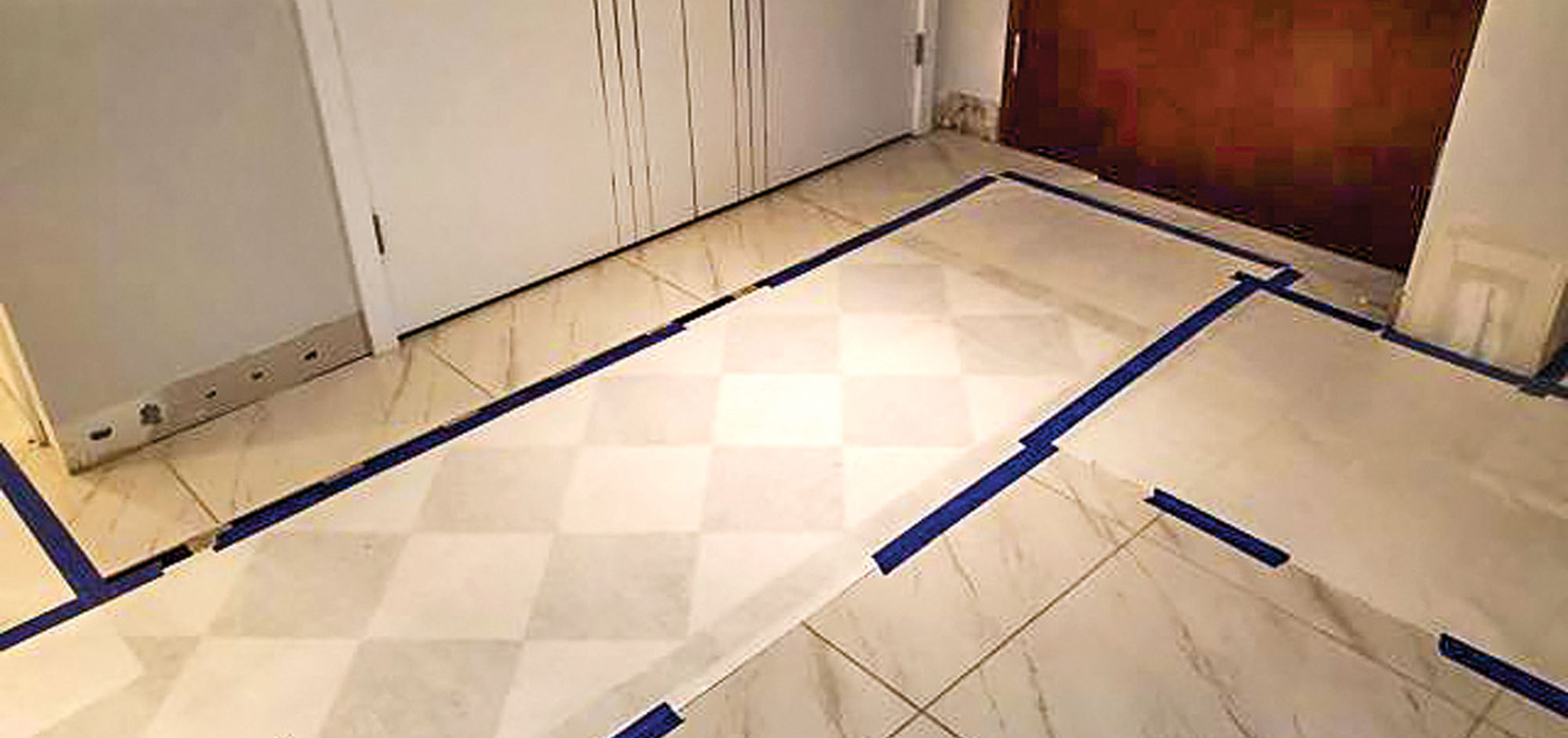 Walking path along a tiled floor during renovation