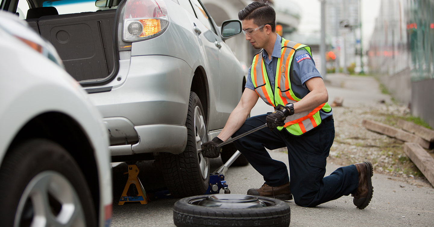 BCAA Road Assist Technician repairing car