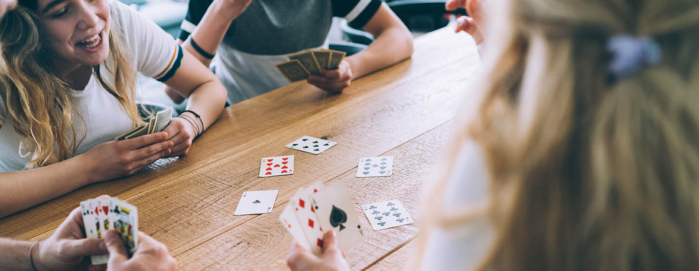 family playing cards