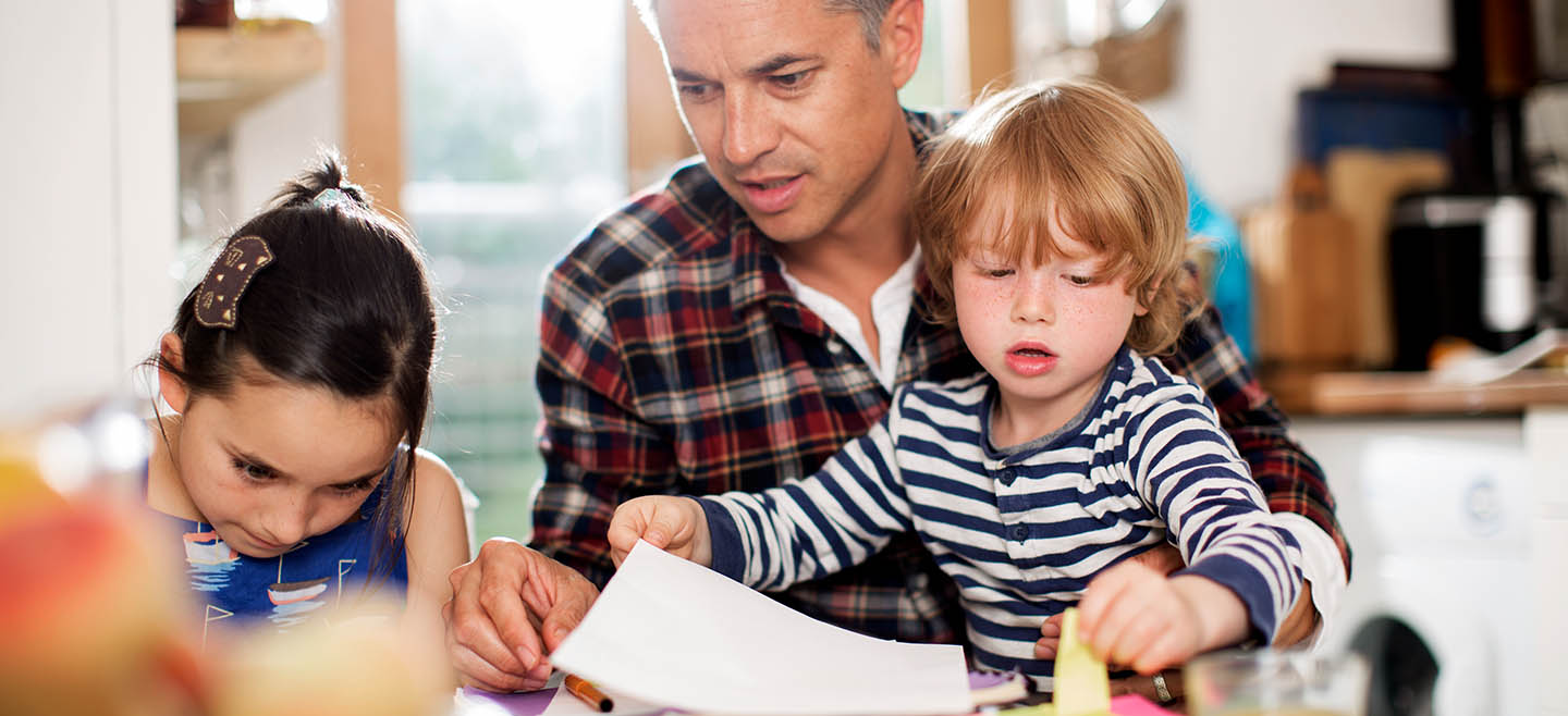 father with kids at home