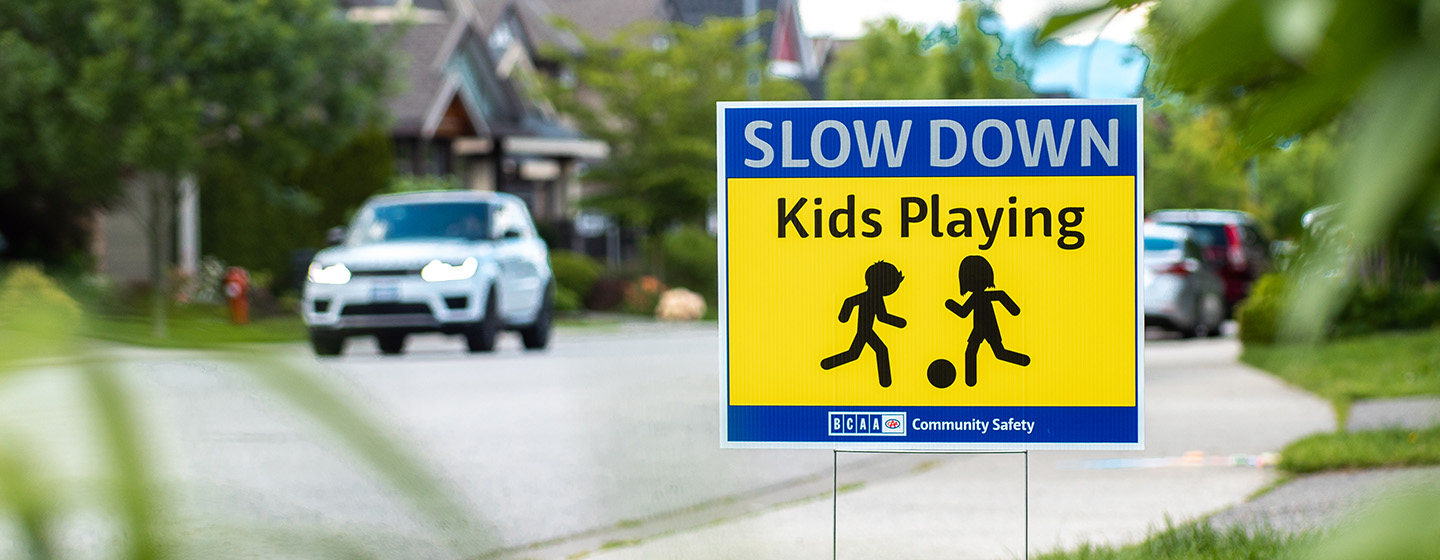 slow down kids playing sign in neighbourhood