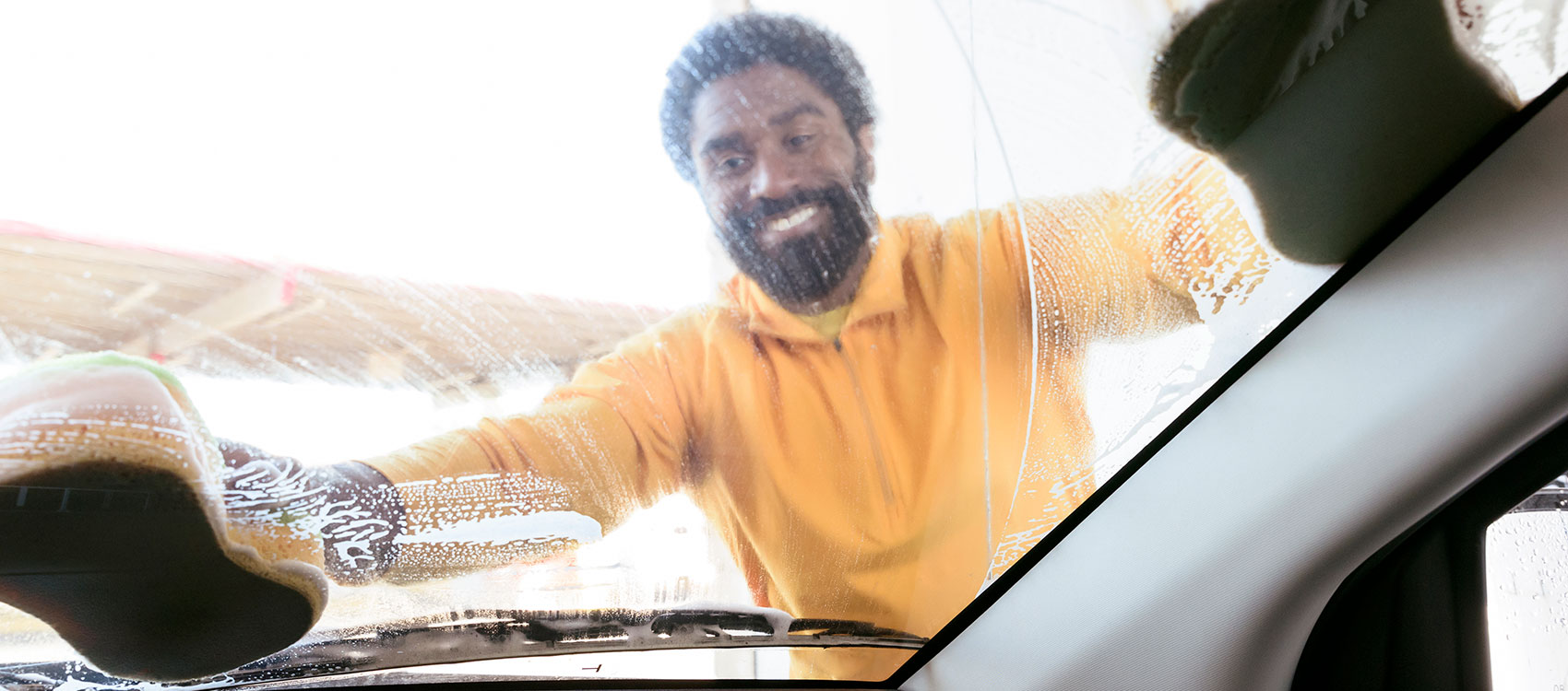 Man washing his car