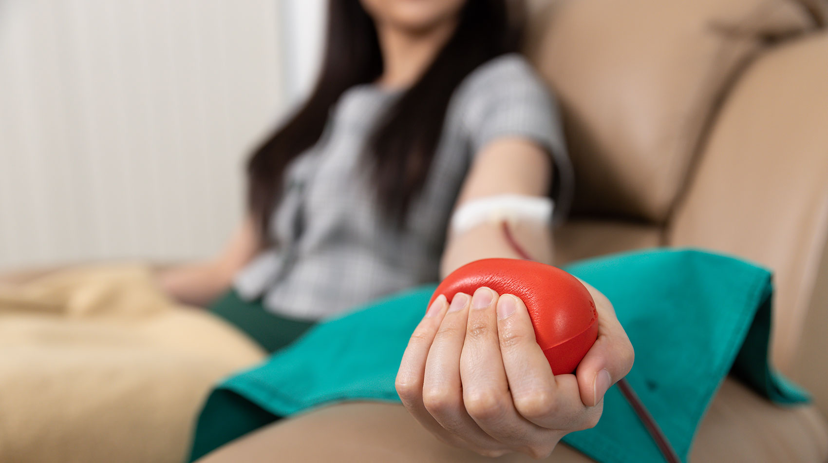 Woman participates in a blood donation