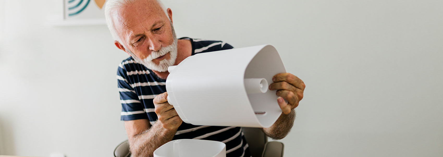 man in a new home assembles his humidifier