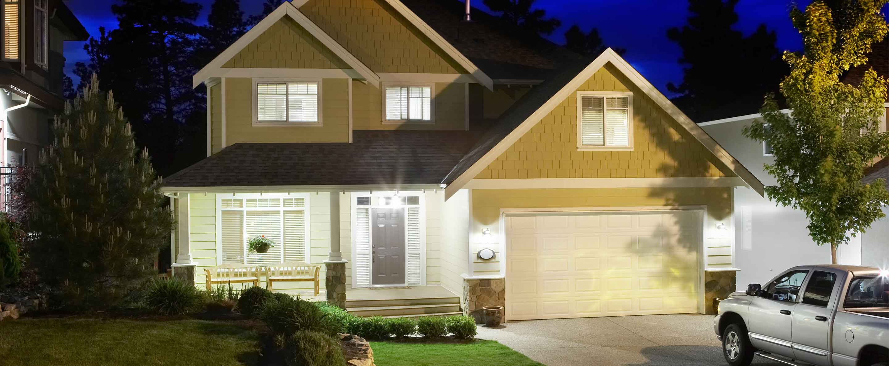 Canada, British Columbia, Kelowna, House exterior and driveway at night