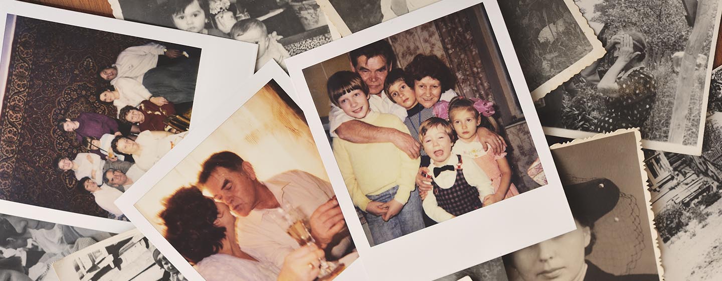 a pile of family polaroid photos