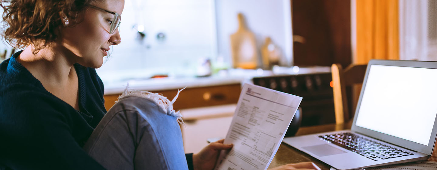 Lady looking at taxes