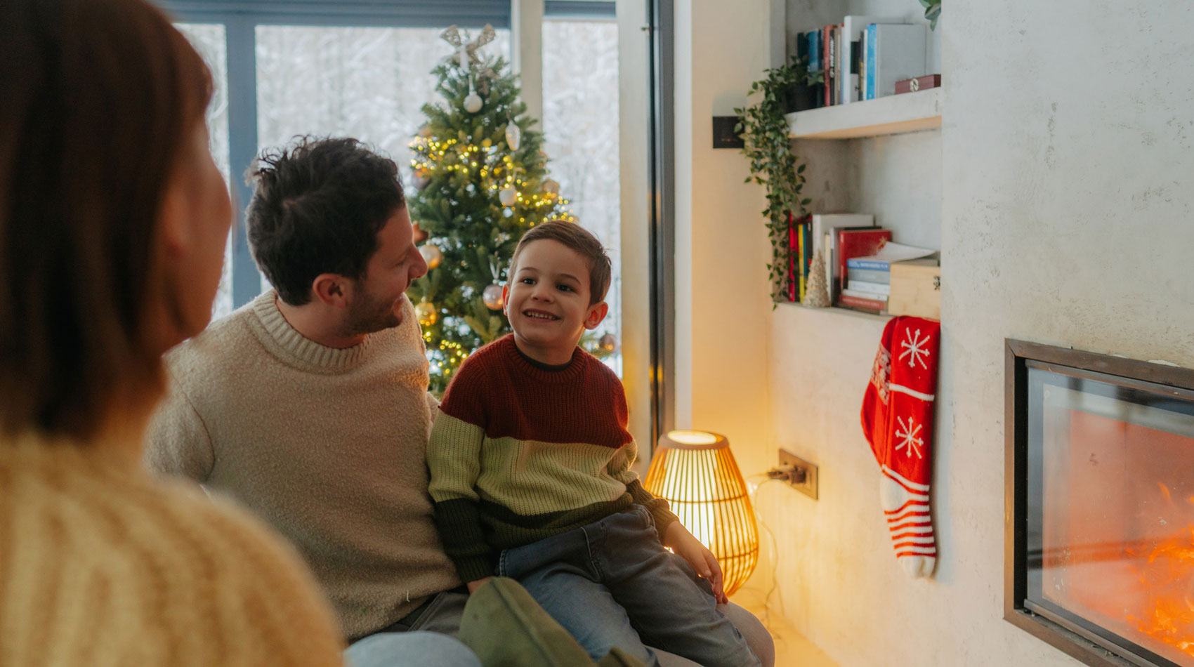 Photo of a happy family in their home on a Christmas day