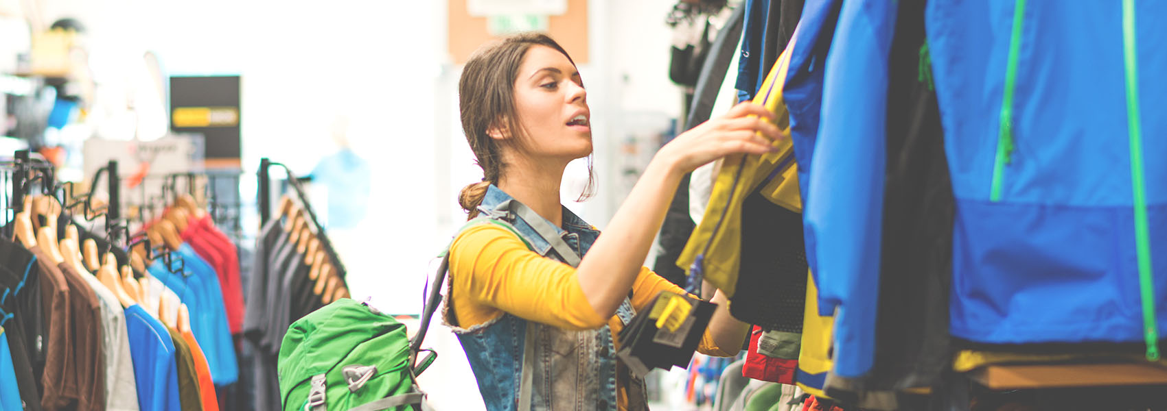 woman shopping in outdoor equipment store