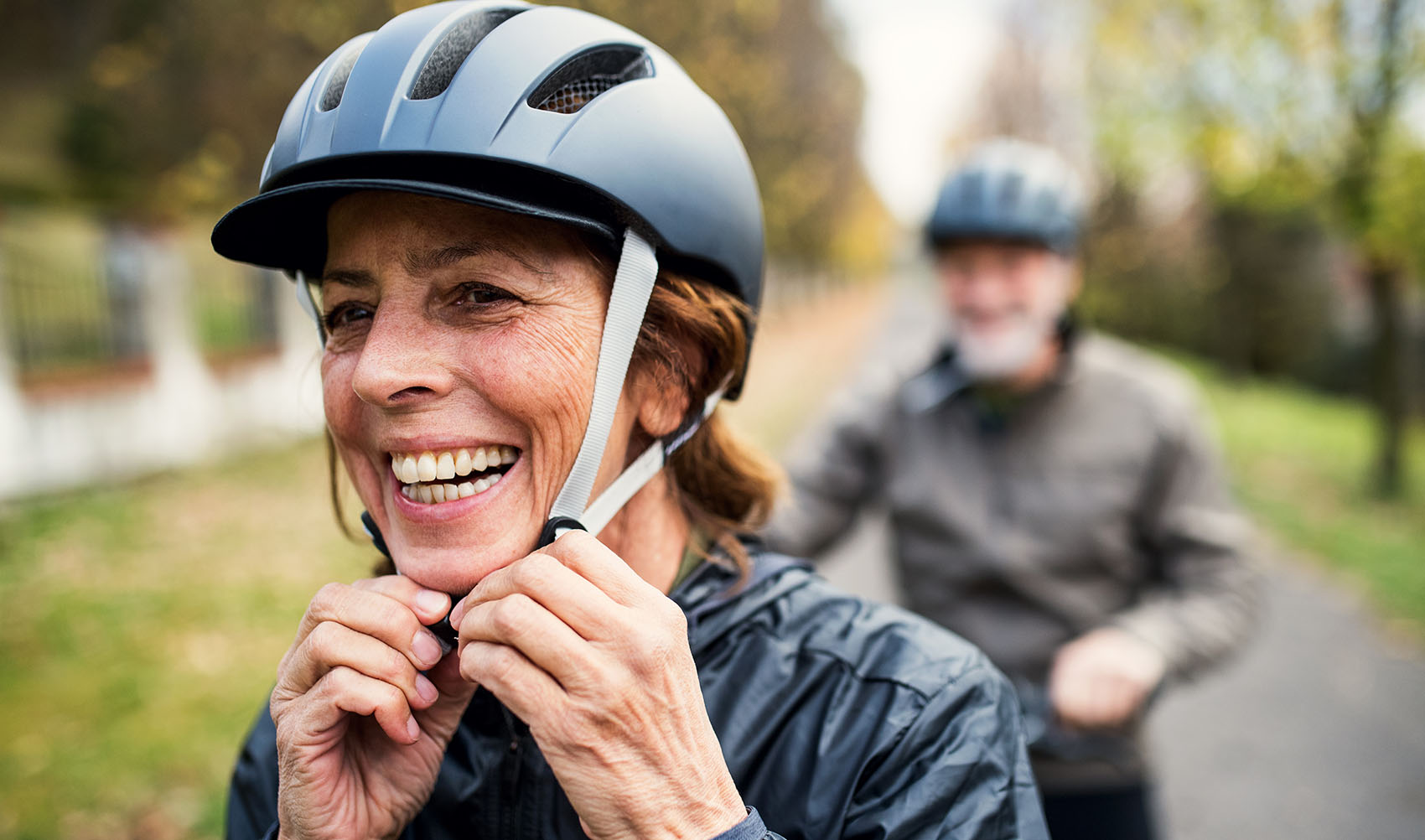 senior couple riding e-bikes