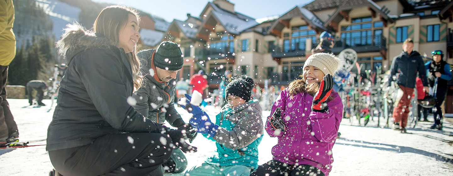 Family playing in snow