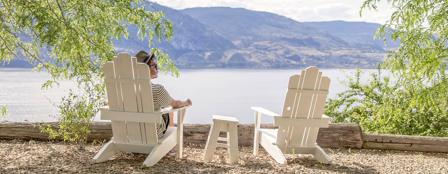 man sitting on chair outdoors