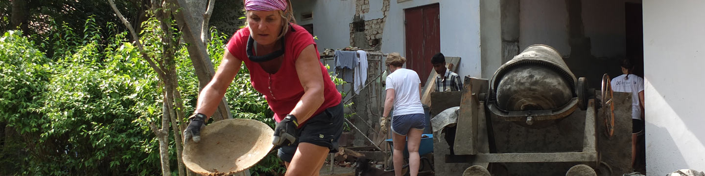 lady sifting gravel