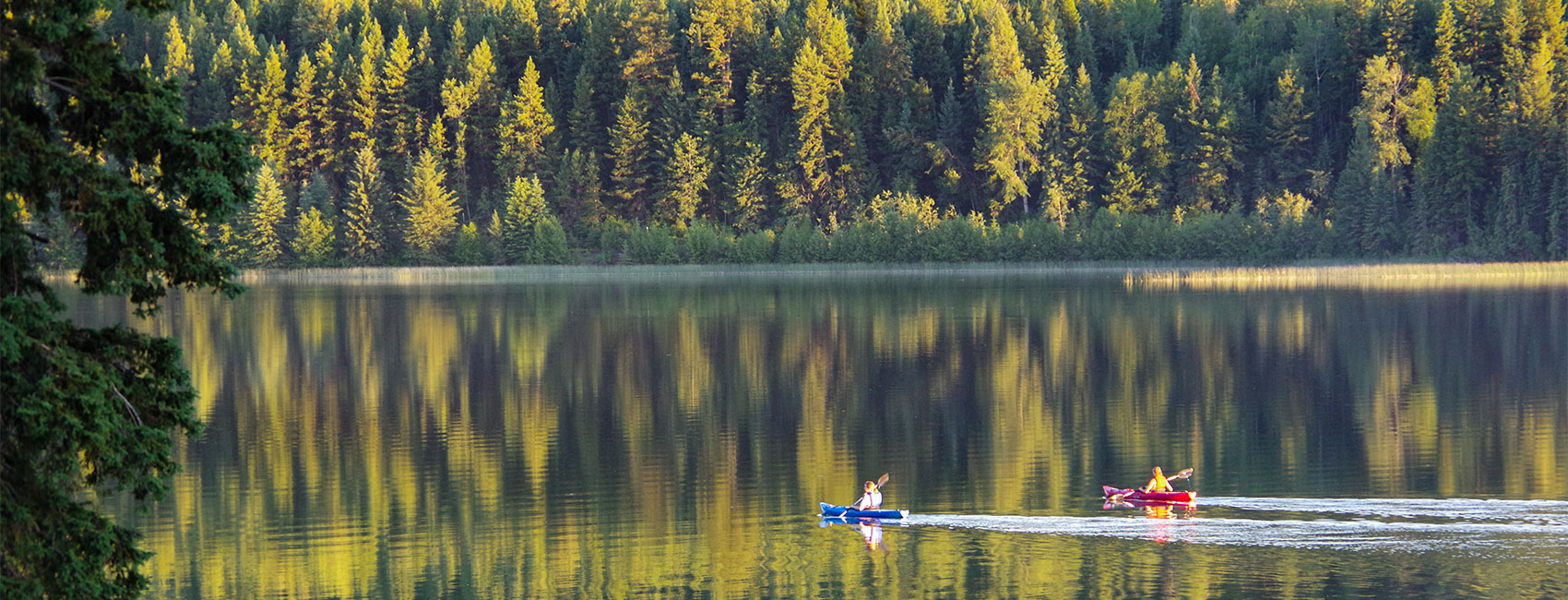 Kayakers on a quiet lake