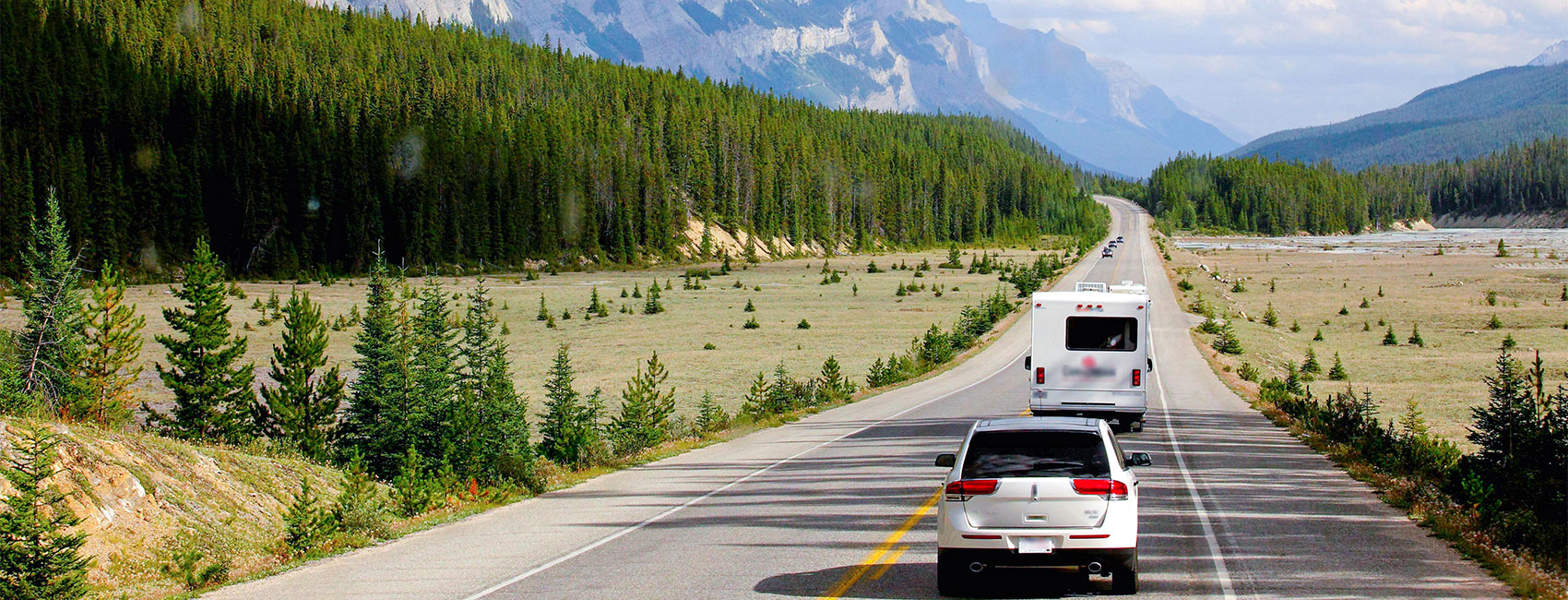 Mountain highway with cars and trucks