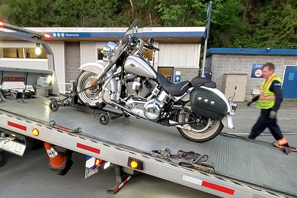 Harley Davidson motorbike on tow truck at BC Ferries terminal