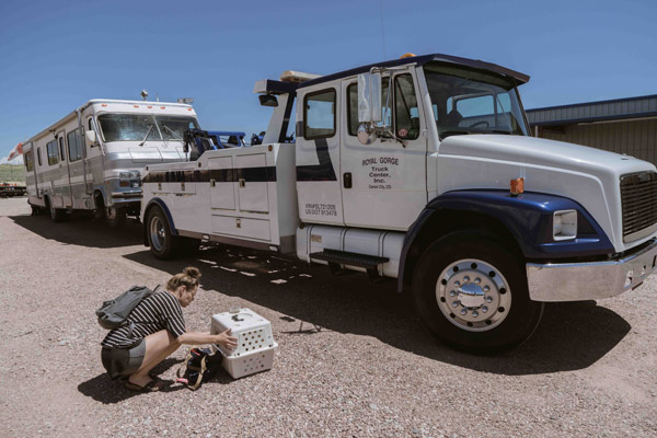 Tow truck towing RV