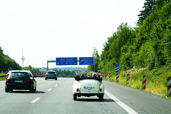 Some cars are driving direction of Frankfurt, Germany