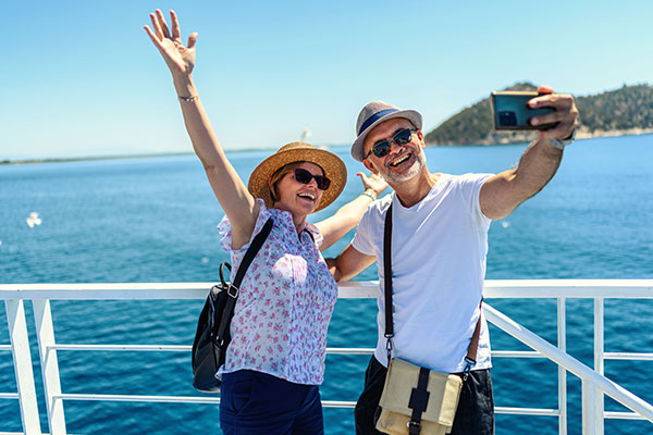  Couple on the ferry boat deck taking a selfie