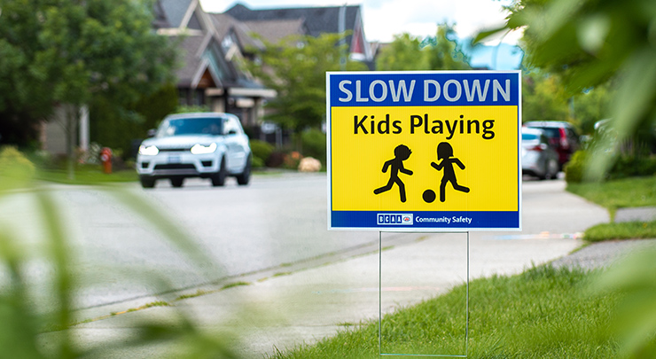 slow down kids playing sign in neighbourhood