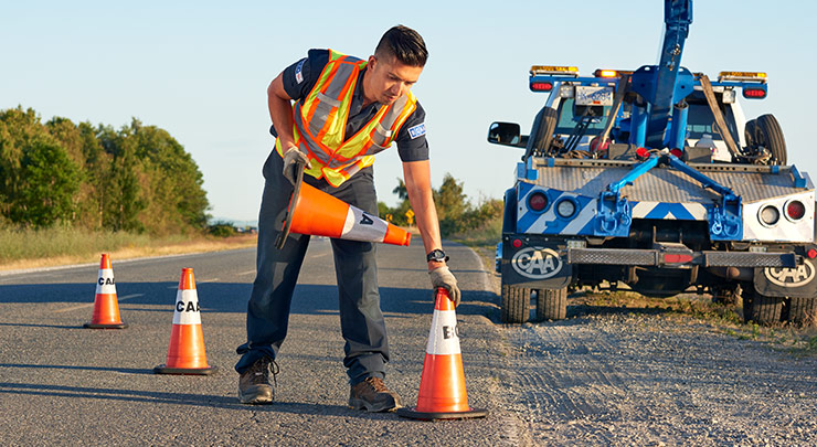 BCAA technician placing traffic cones