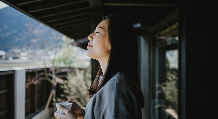 woman relaxed on porch