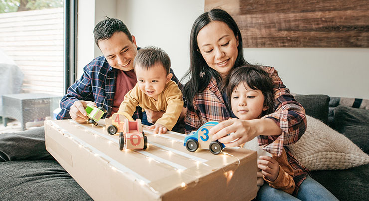 parents playing with children